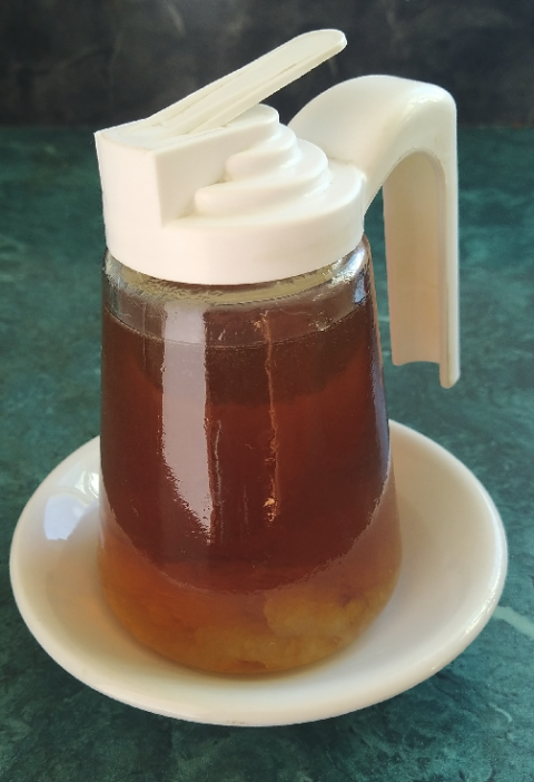 Maple Syrup in a glass dispenser