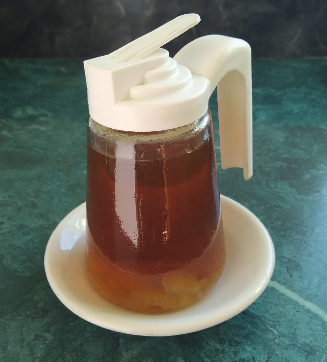 Maple Syrup in a glass dispenser